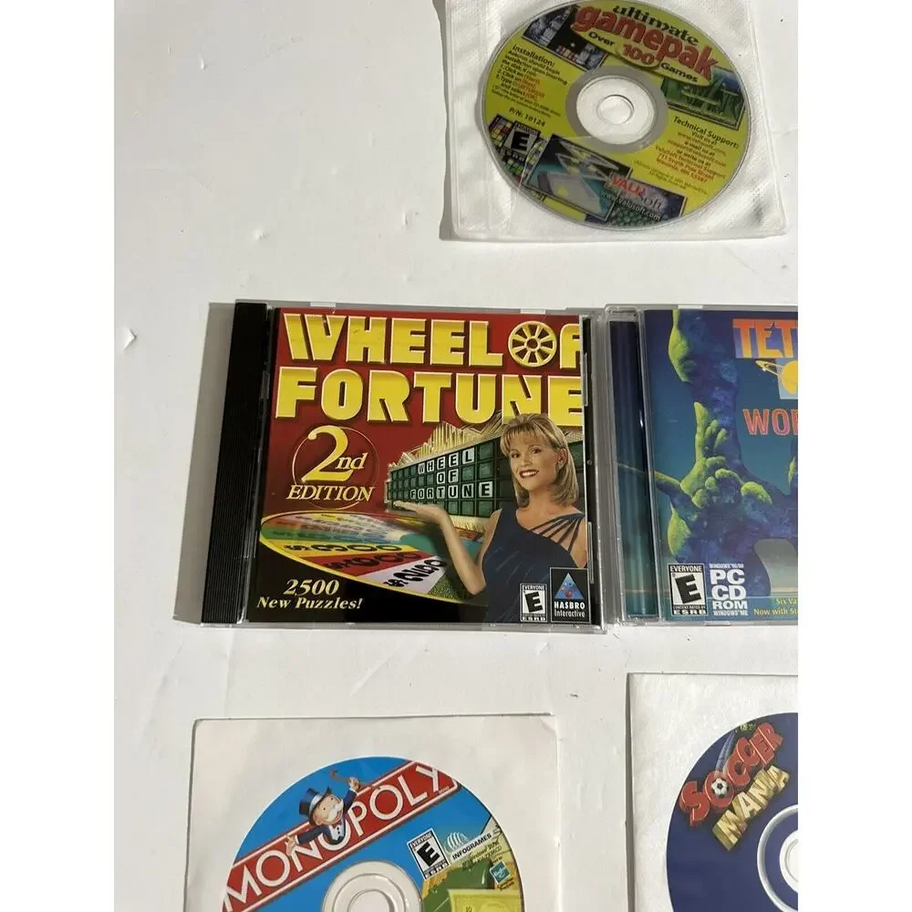 PC Game Lot 7 Gamepack 100 Monopoly Boggle Tetris Candyland Soccer Wheel Fortune